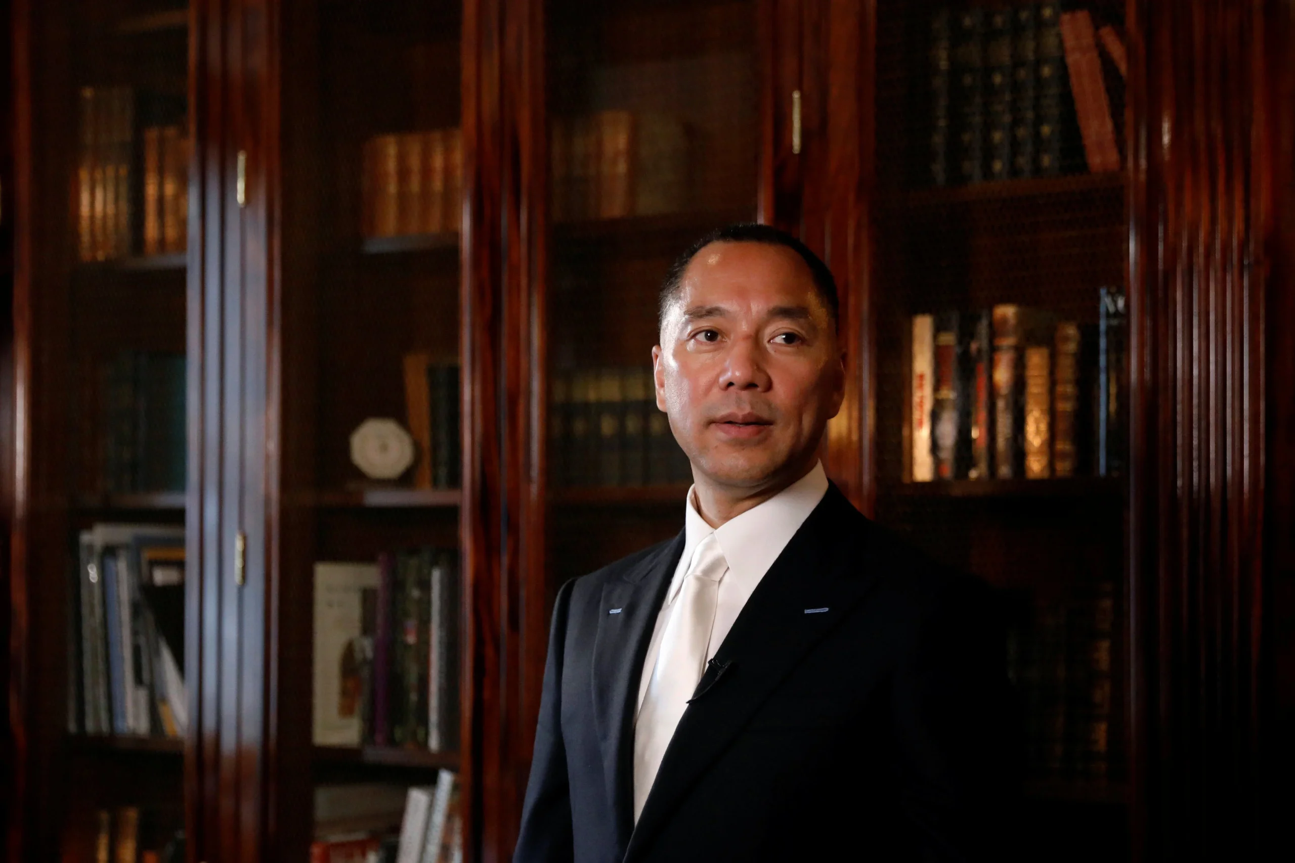 Exiled Chinese businessman's Chief of Staff pleads guilty to fraud (Credits: SCMP)