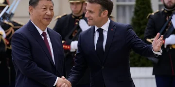 Macron urges Xi to address trade imbalances and unfair practices (Credits: AP Photo)