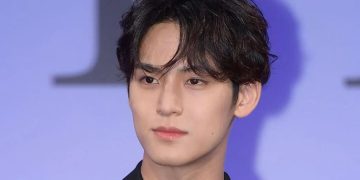 Mingyu's playful post-performance antics resonate widely on social media