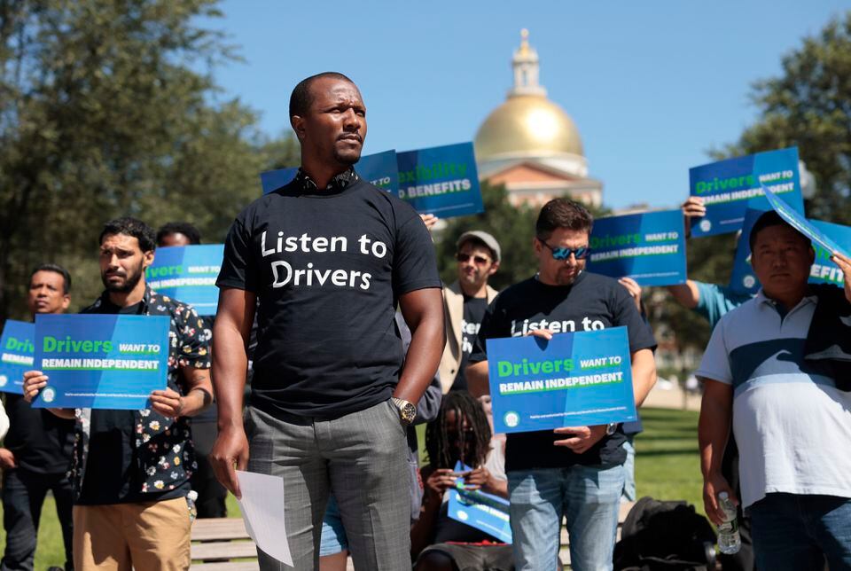 Uber and Lyft face scrutiny over worker classification and legal obligations (Credits: The Boston Globe)