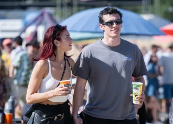 Dua Lipa and Callum Turner (Image via Getty)