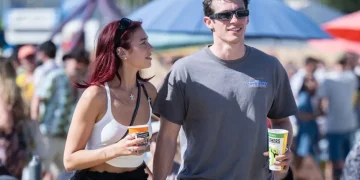 Dua Lipa and Callum Turner (Image via Getty)