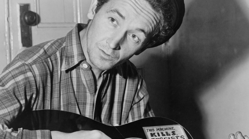 Woody Guthrie (Image via Getty)