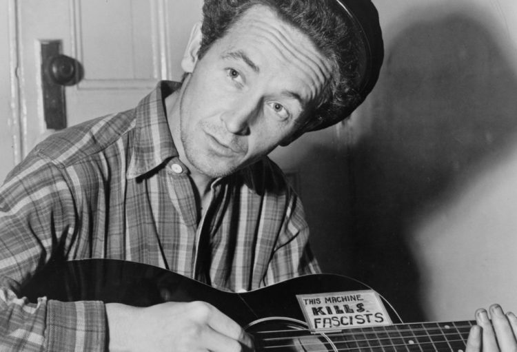 Woody Guthrie (Image via Getty)