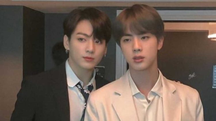 Y8dyrkhd(5) - Controversy and Defense: BTS Jin's Actions Toward Jungkook Stir Intense Debate