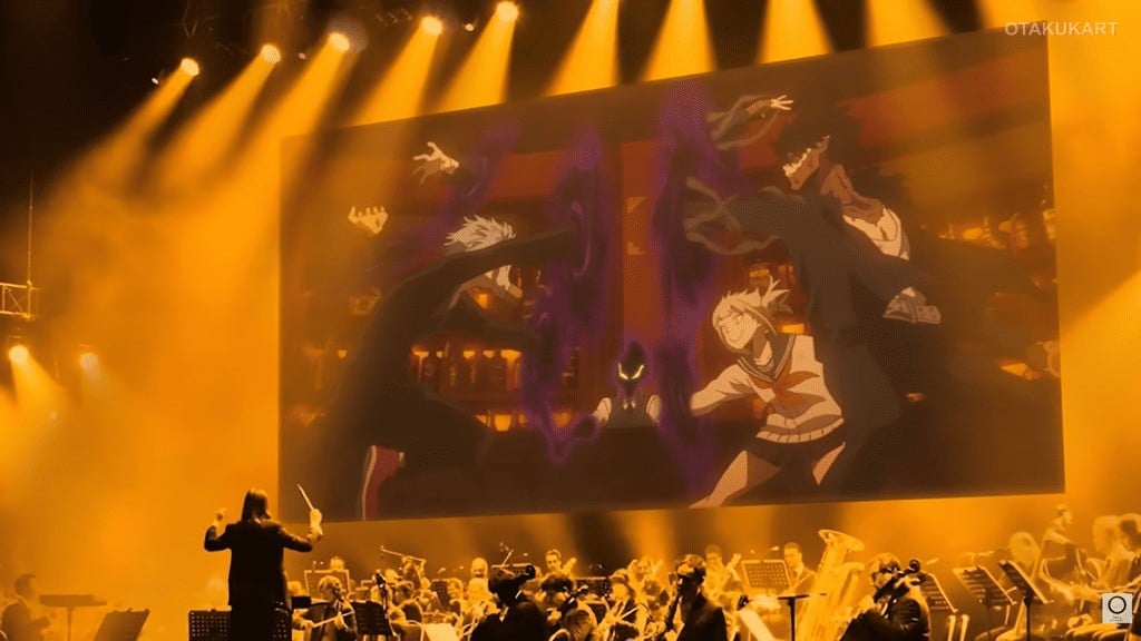 Live orchestra performs the My Hero Academia soundtrack while anime scenes play on a giant screen during My Hero Academia in Concert.