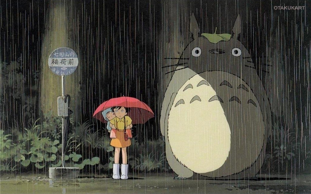 atsuki and Mei standing under a red umbrella with Totoro at the rainy bus stop in My Neighbor Totoro.