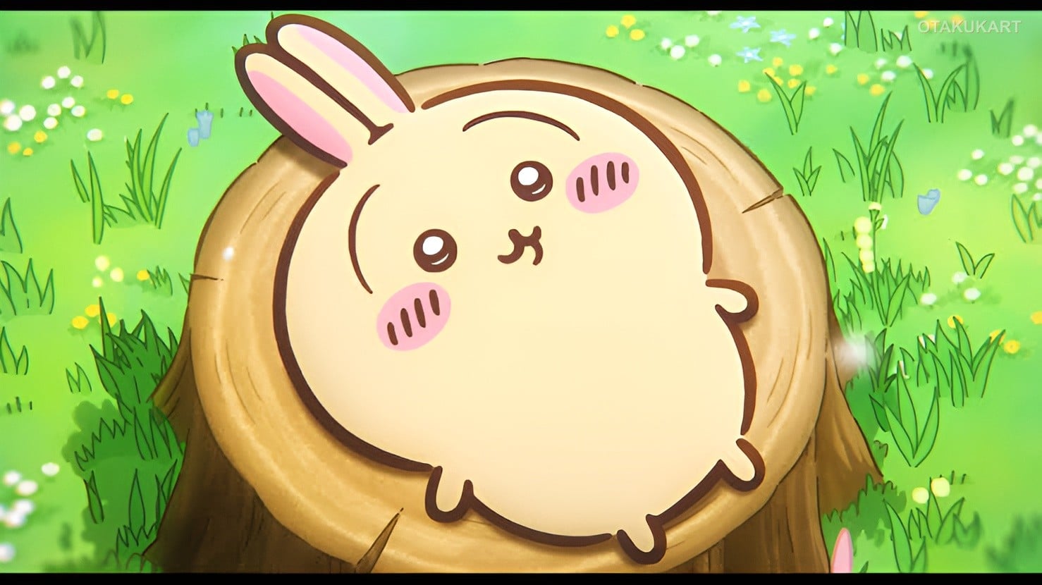 Usagi from Chiikawa: The Secret of the Mermaid Island resting on a tree stump in a grassy setting
